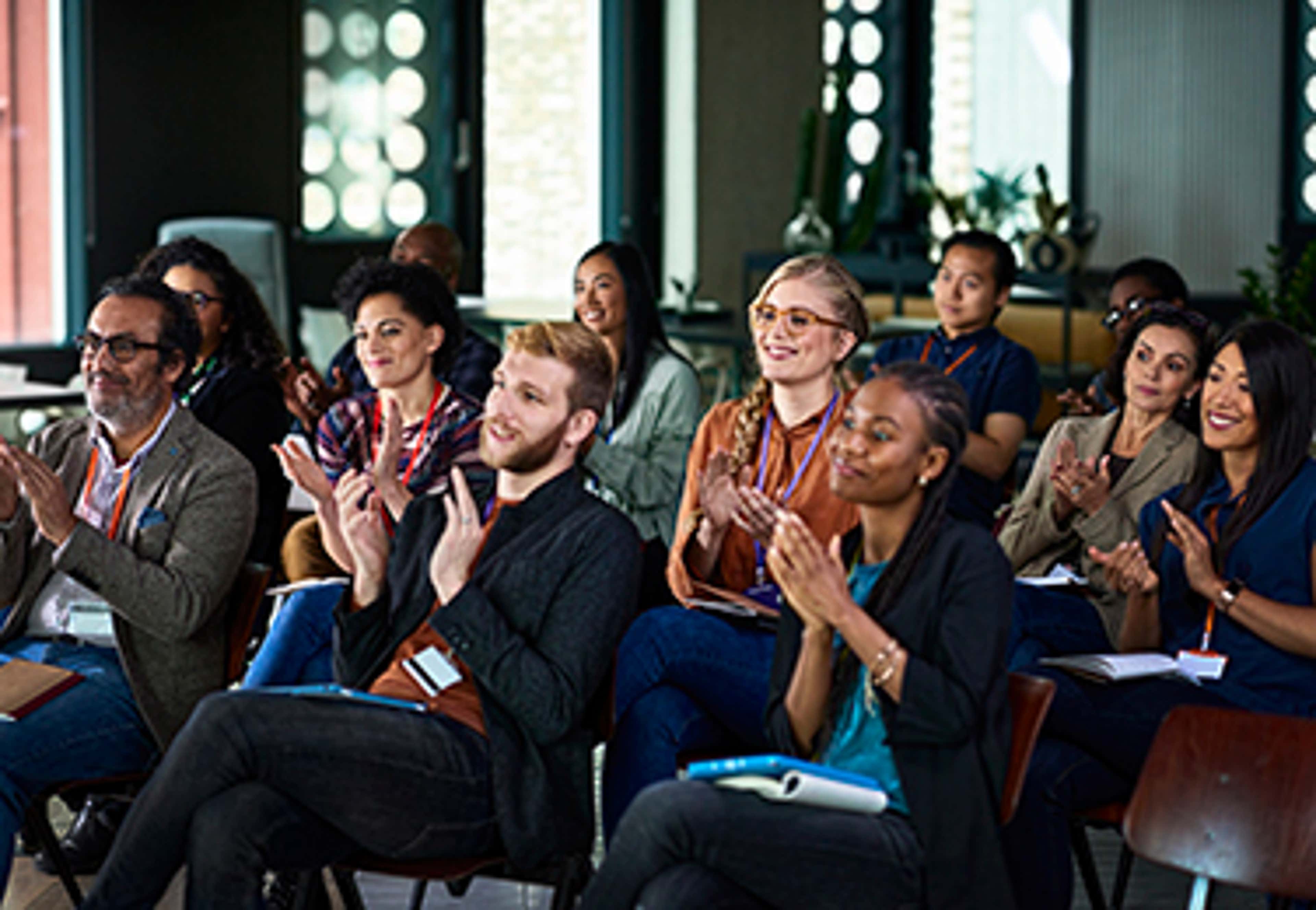 Group of people clapping