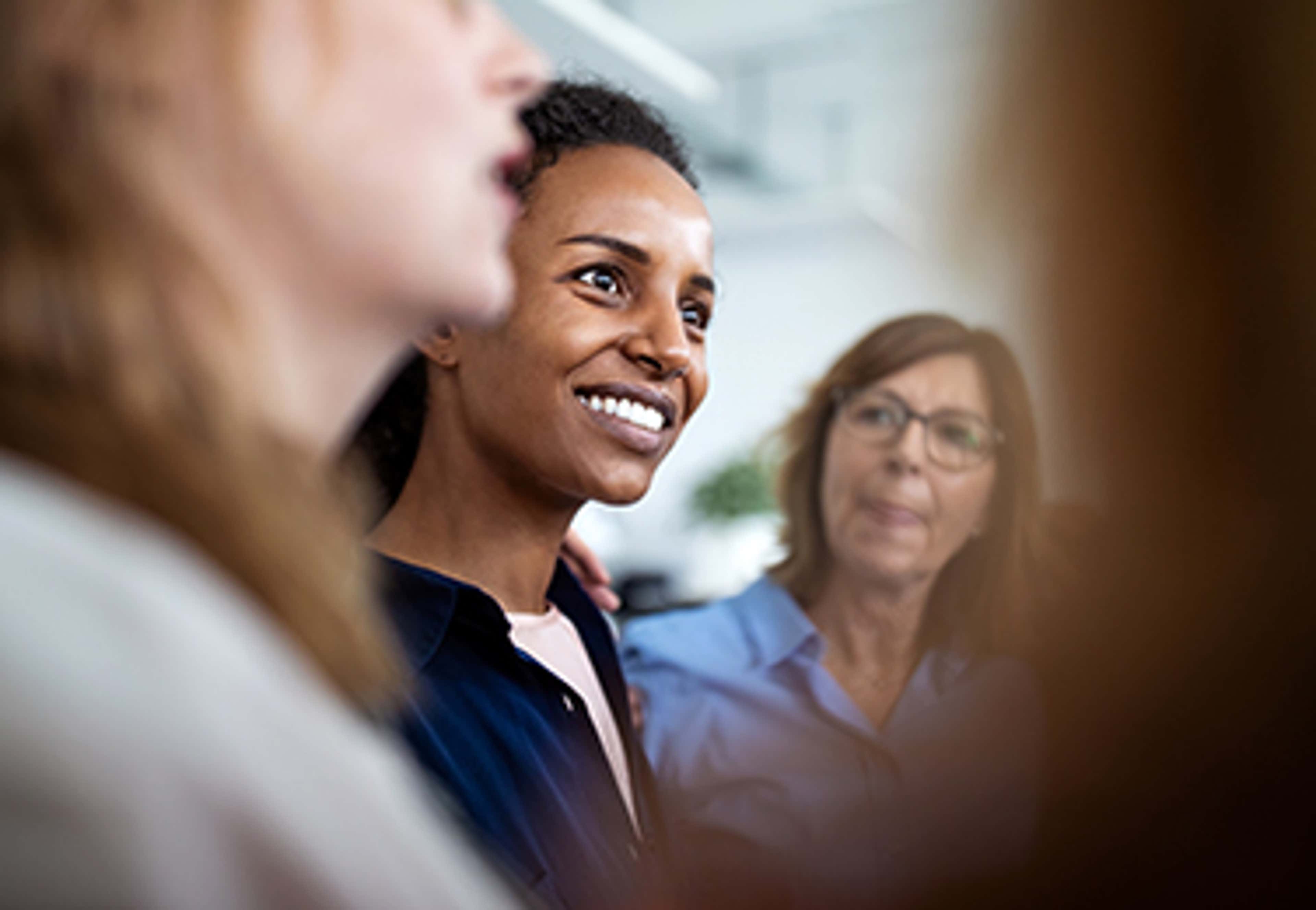 Three people sitting together