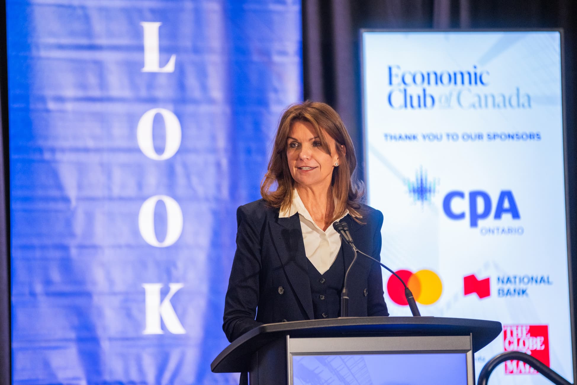 Carol Wilding speaking at the Economic Club of Canada