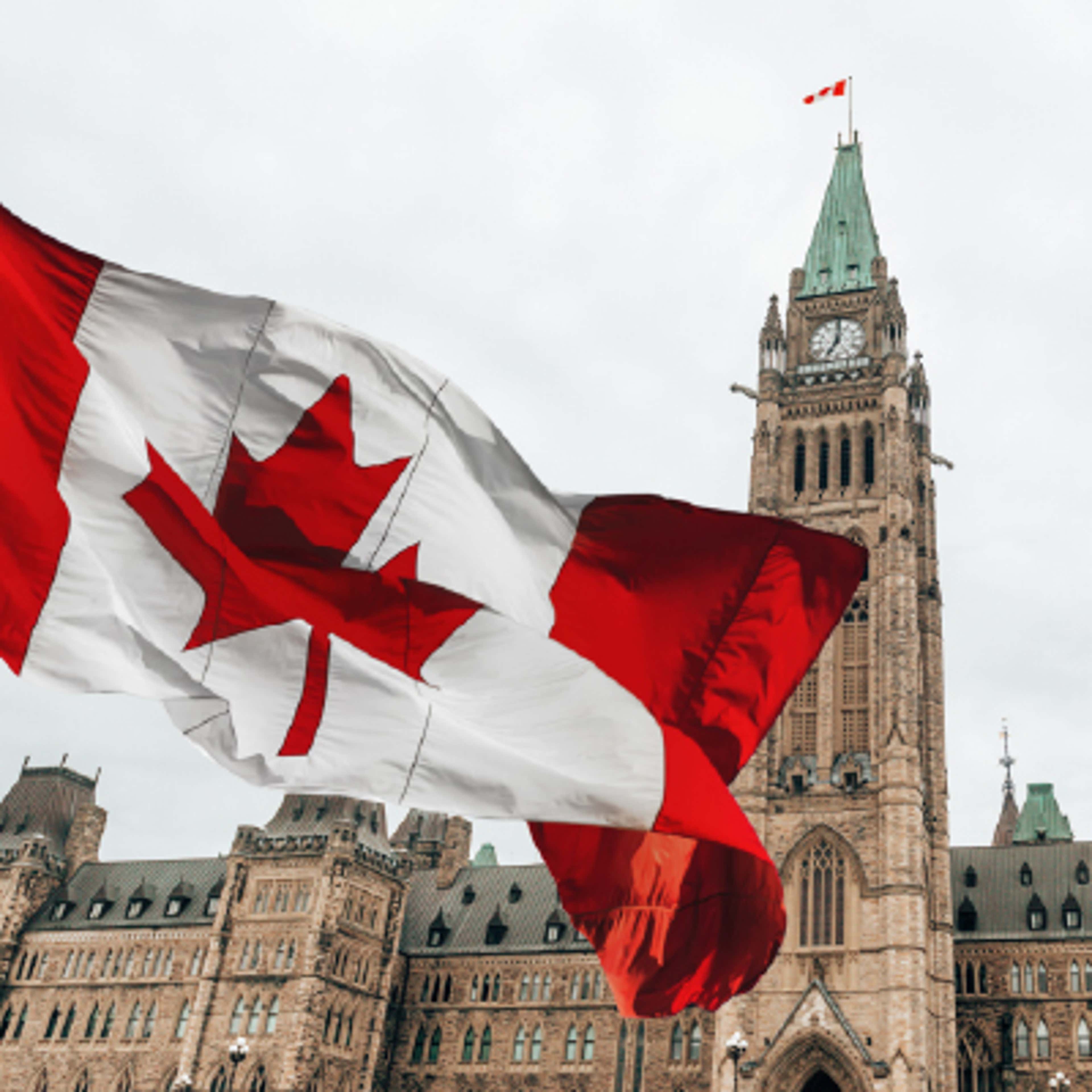 Canadian flag and parliament hill