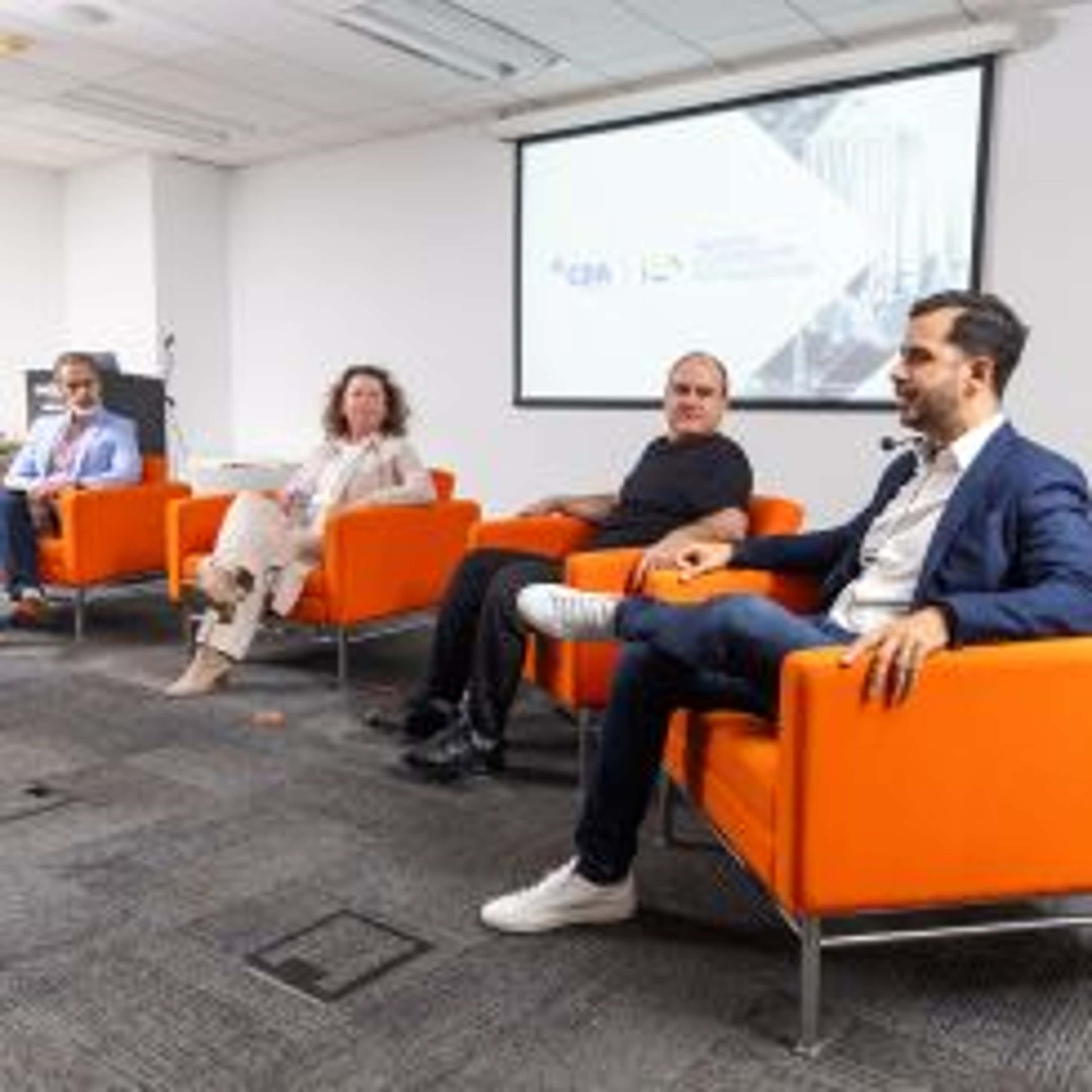 ILA speakers sharing in the front of the classroom