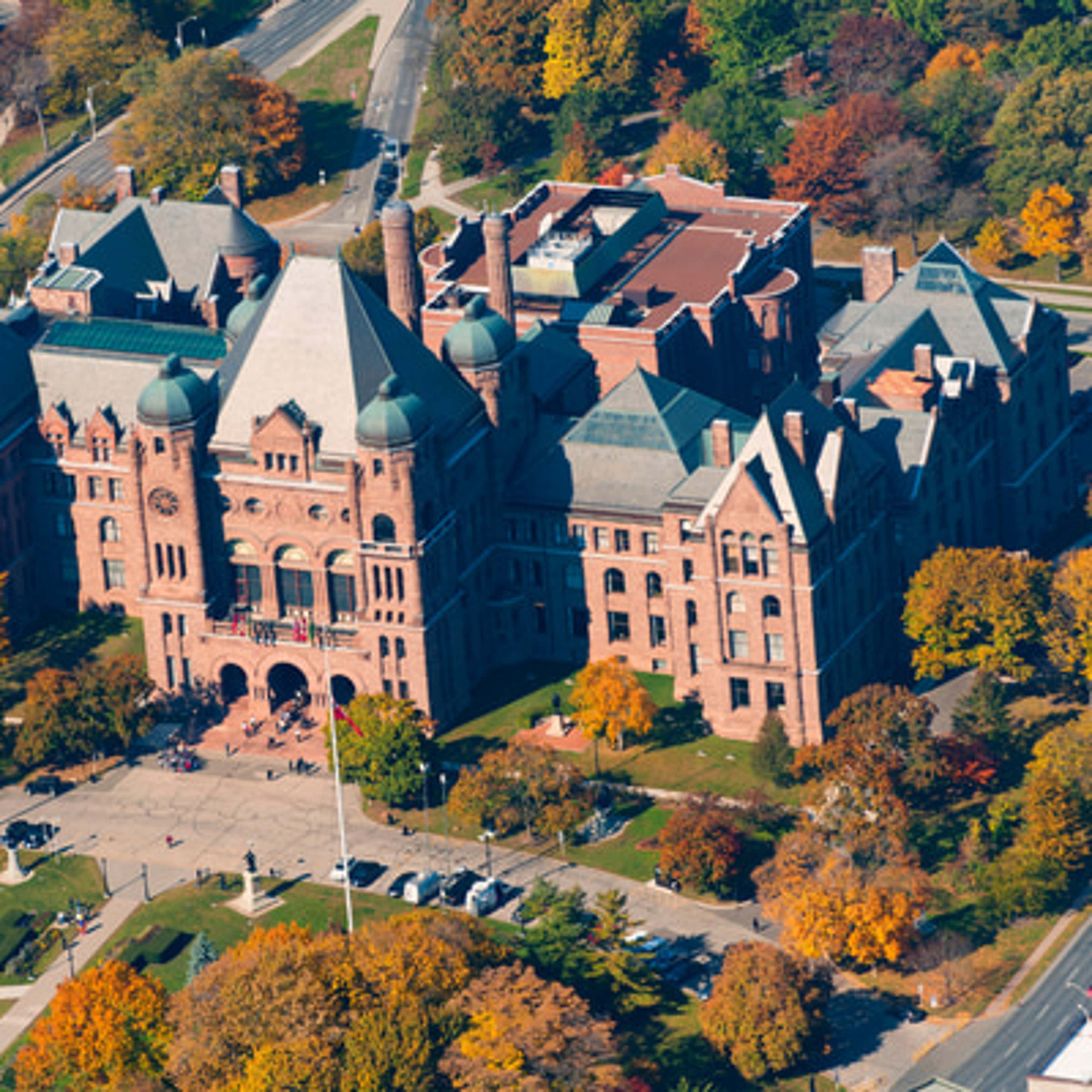 Large buildings featuring numerous windows, showcasing a modern architectural design.