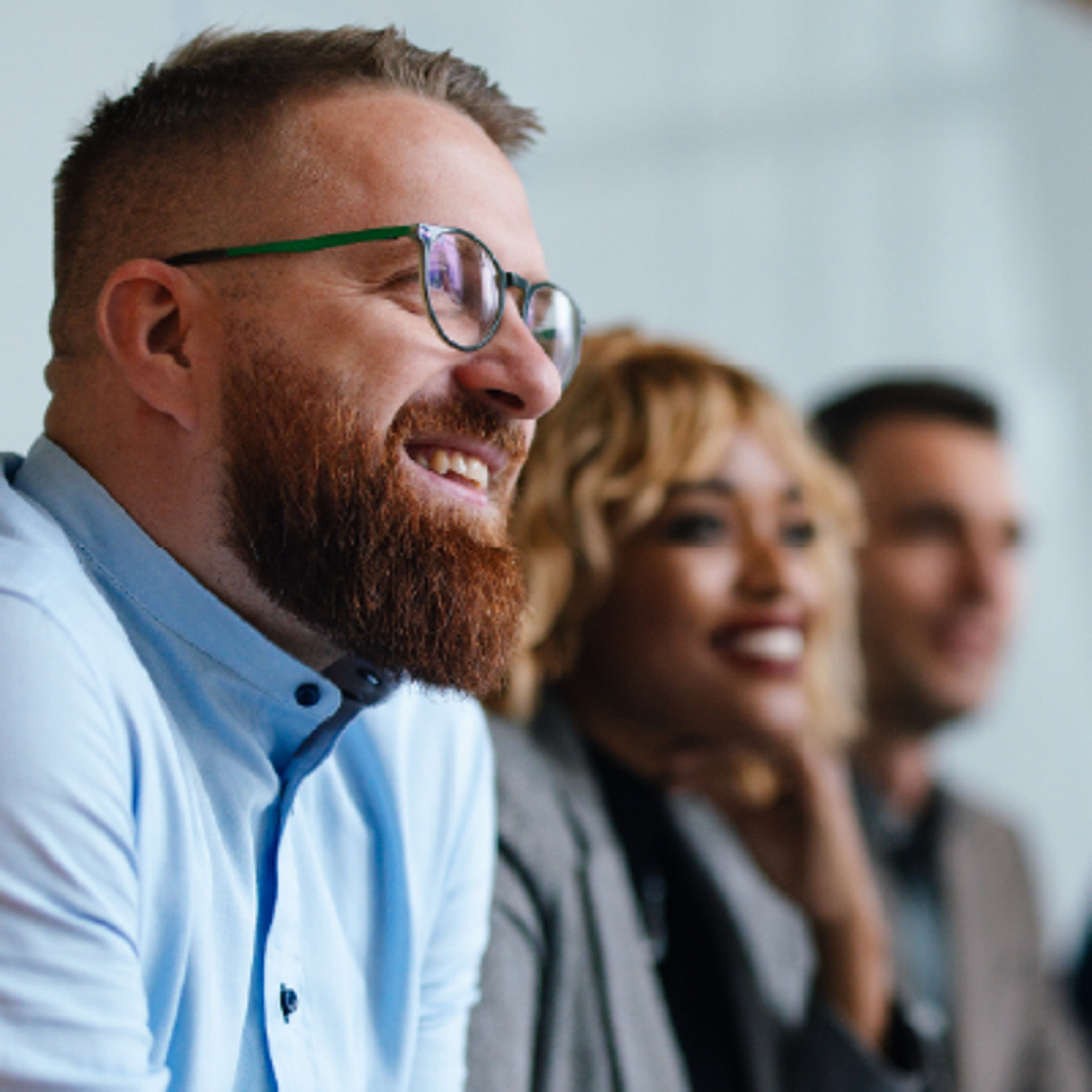 A group of people smiling