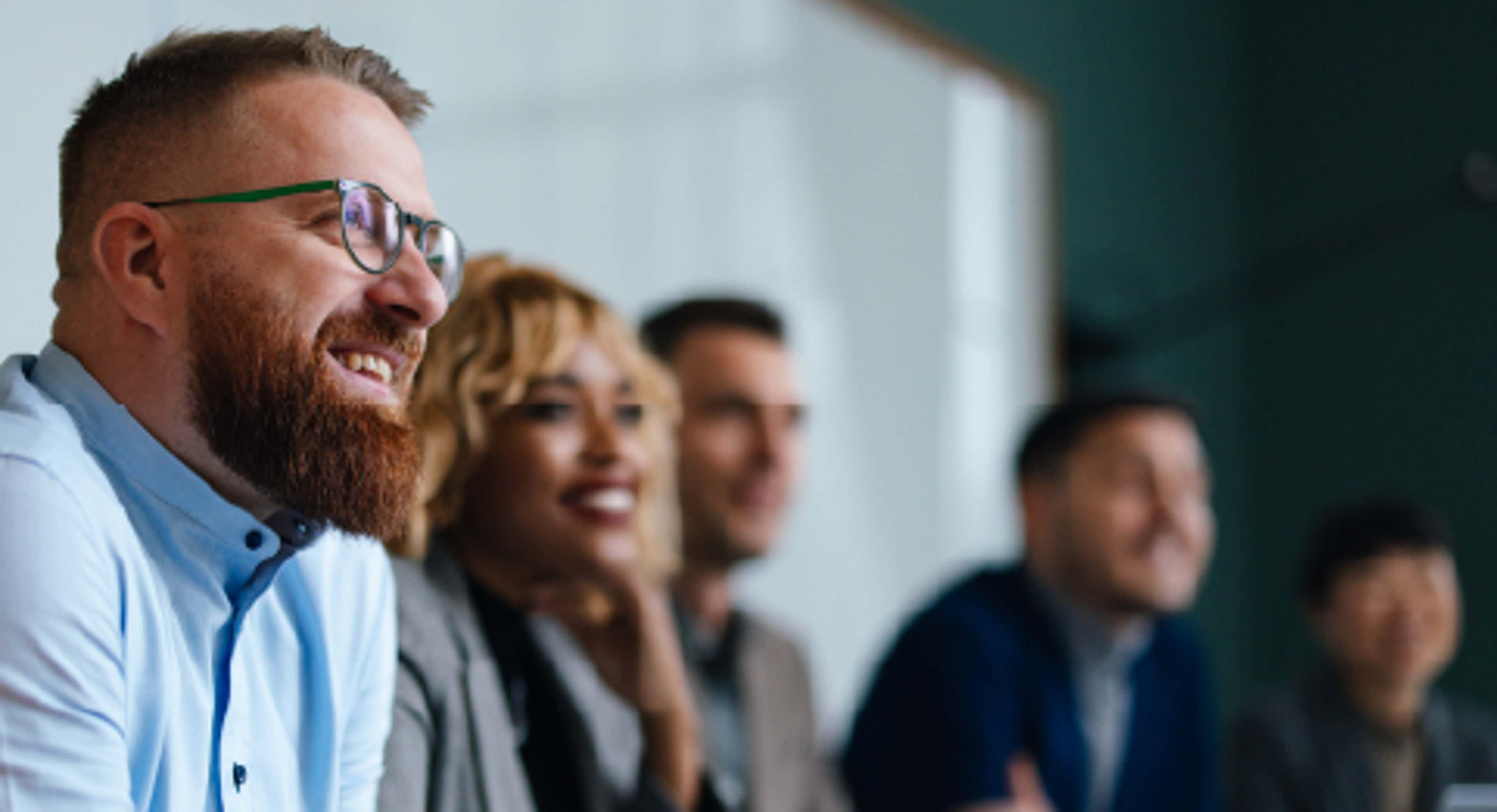 A group of people smiling