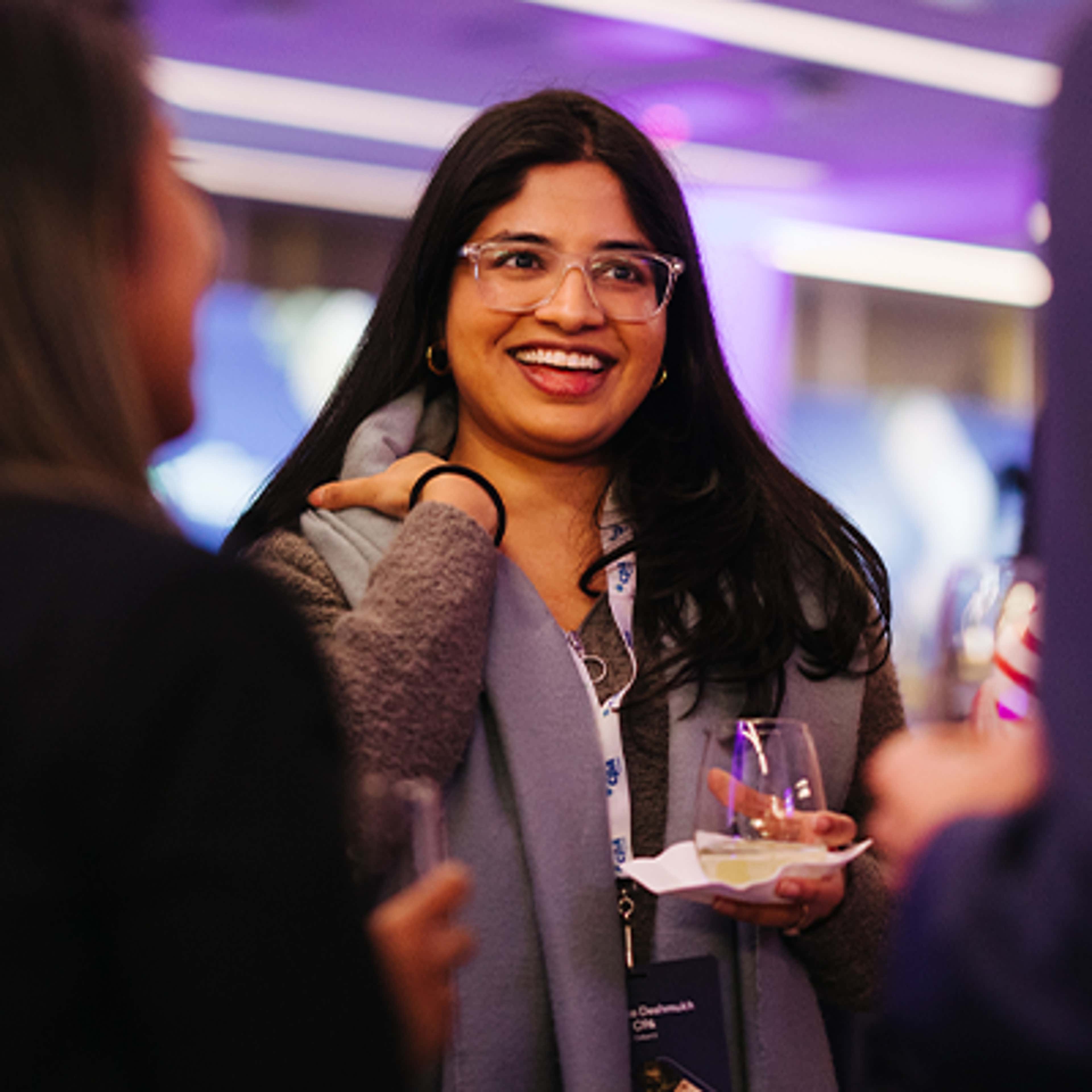 Woman smiling in conversation