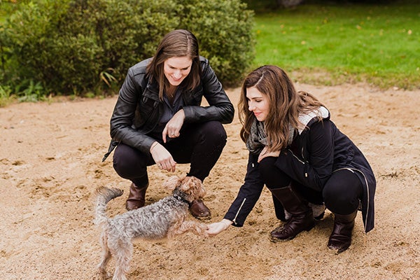 Trisha Egberts playing with a dog