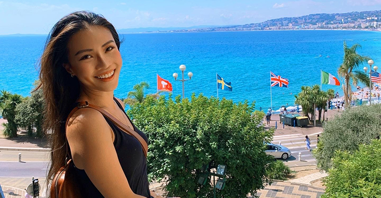 Della Wang overlooking the coast of Nice