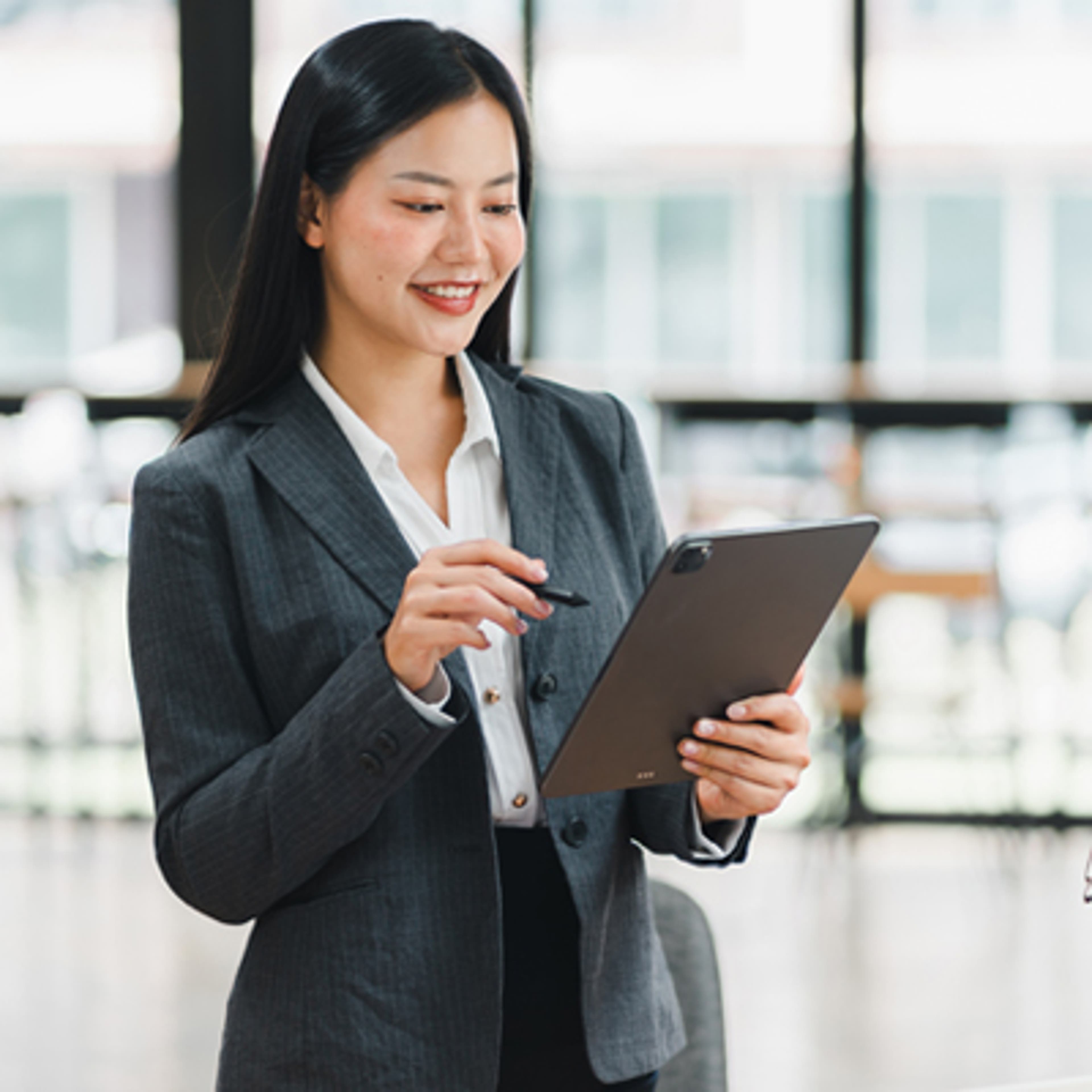 A woman with a clipboard