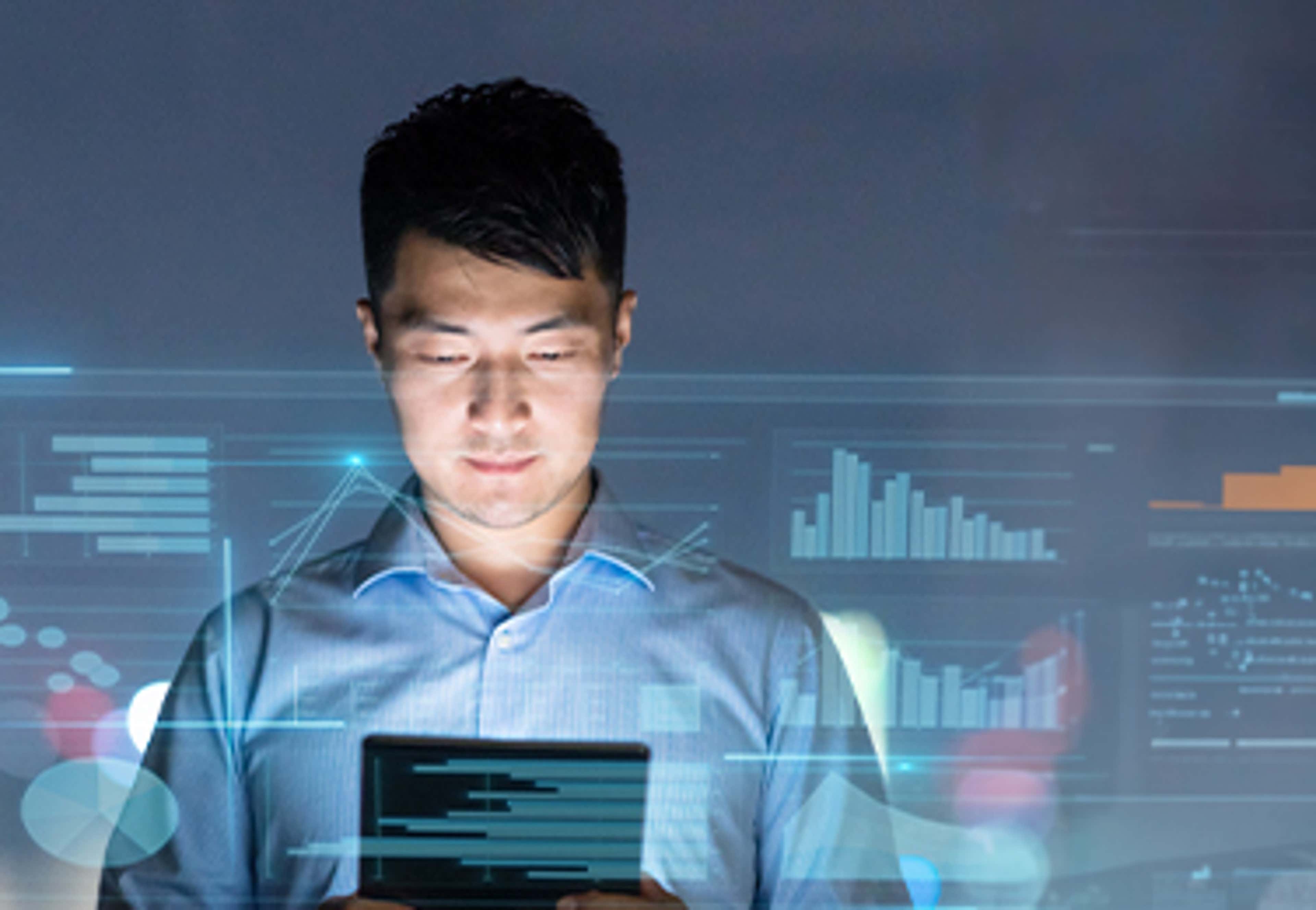 man staring at a screen