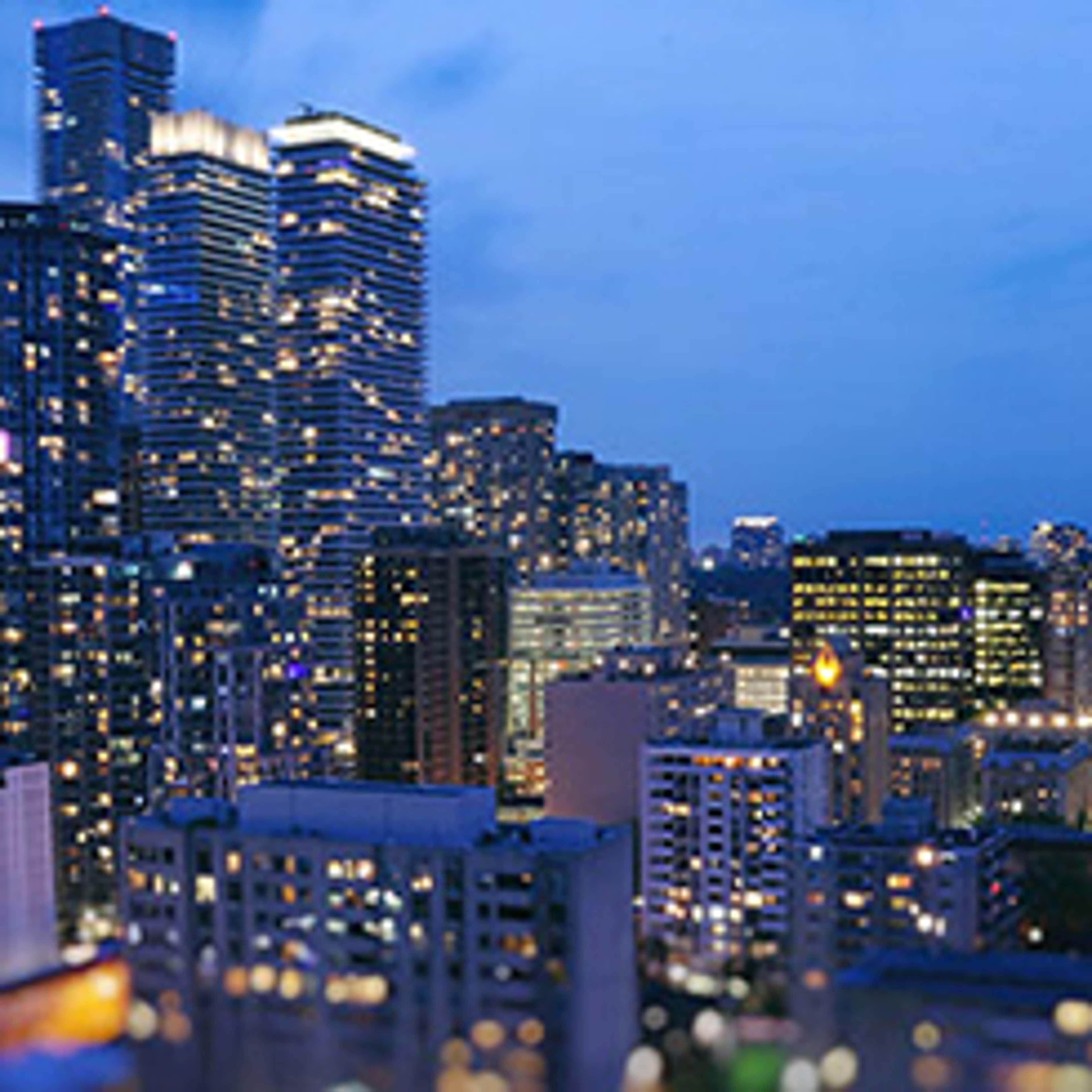City skyline with skyscrapers at night