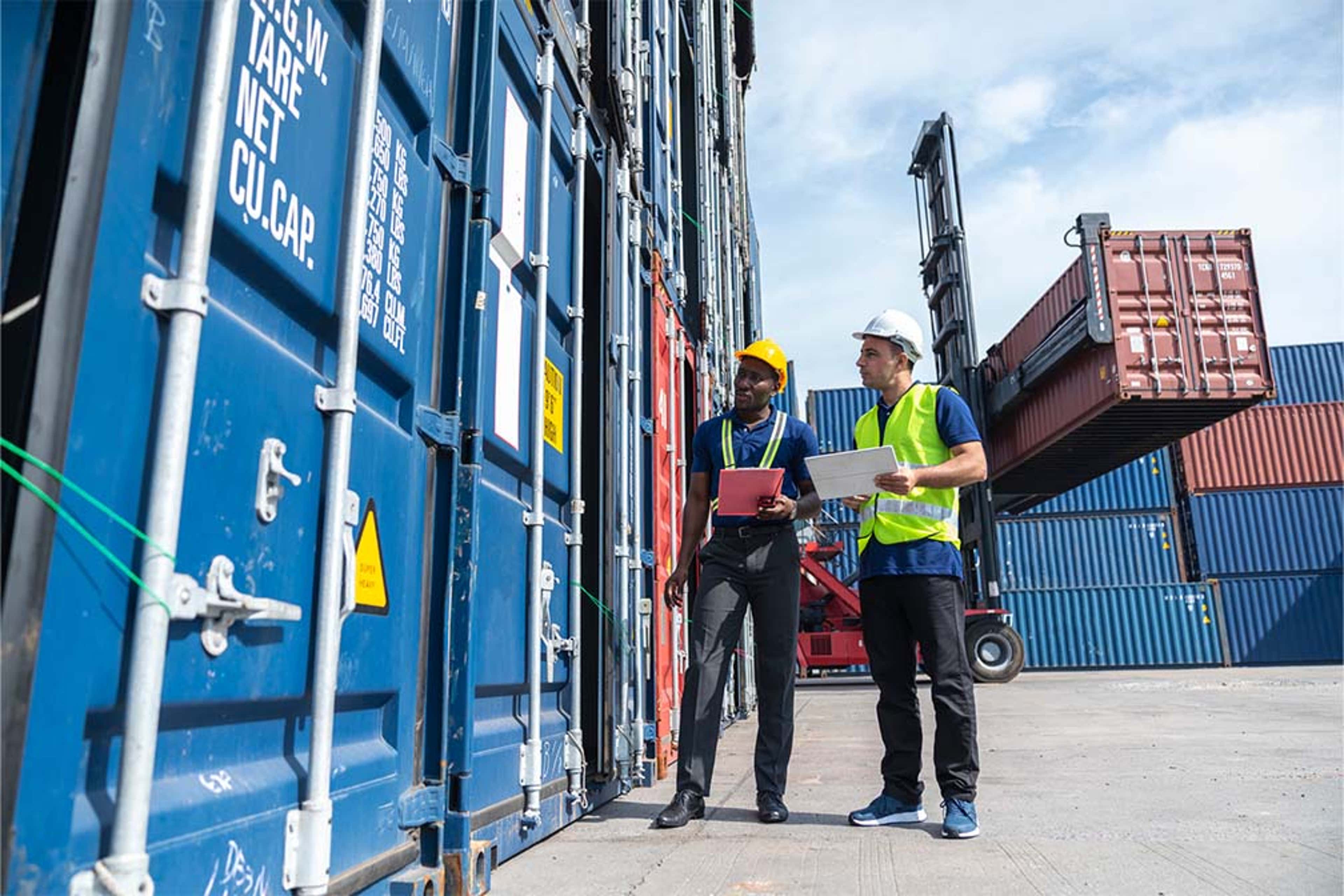 Two men at a trading port