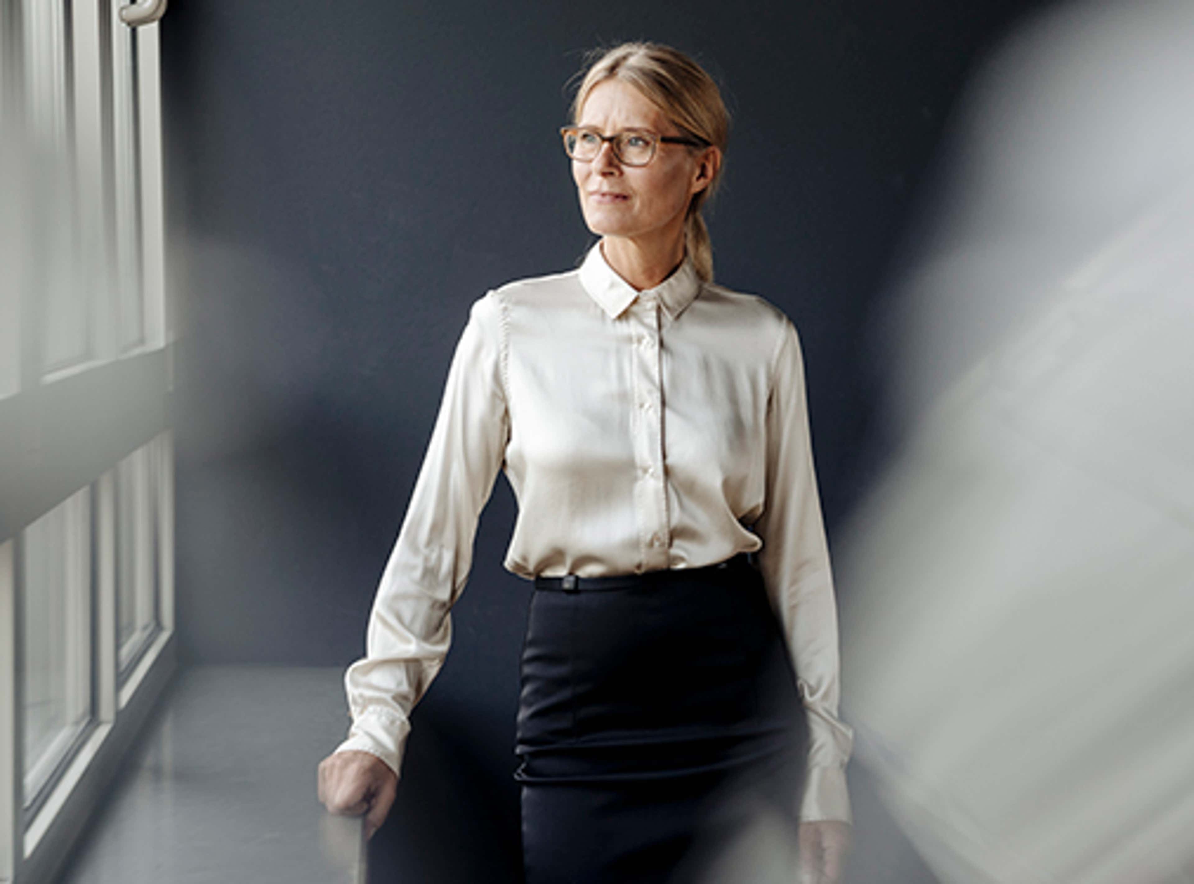 Professional woman looking out