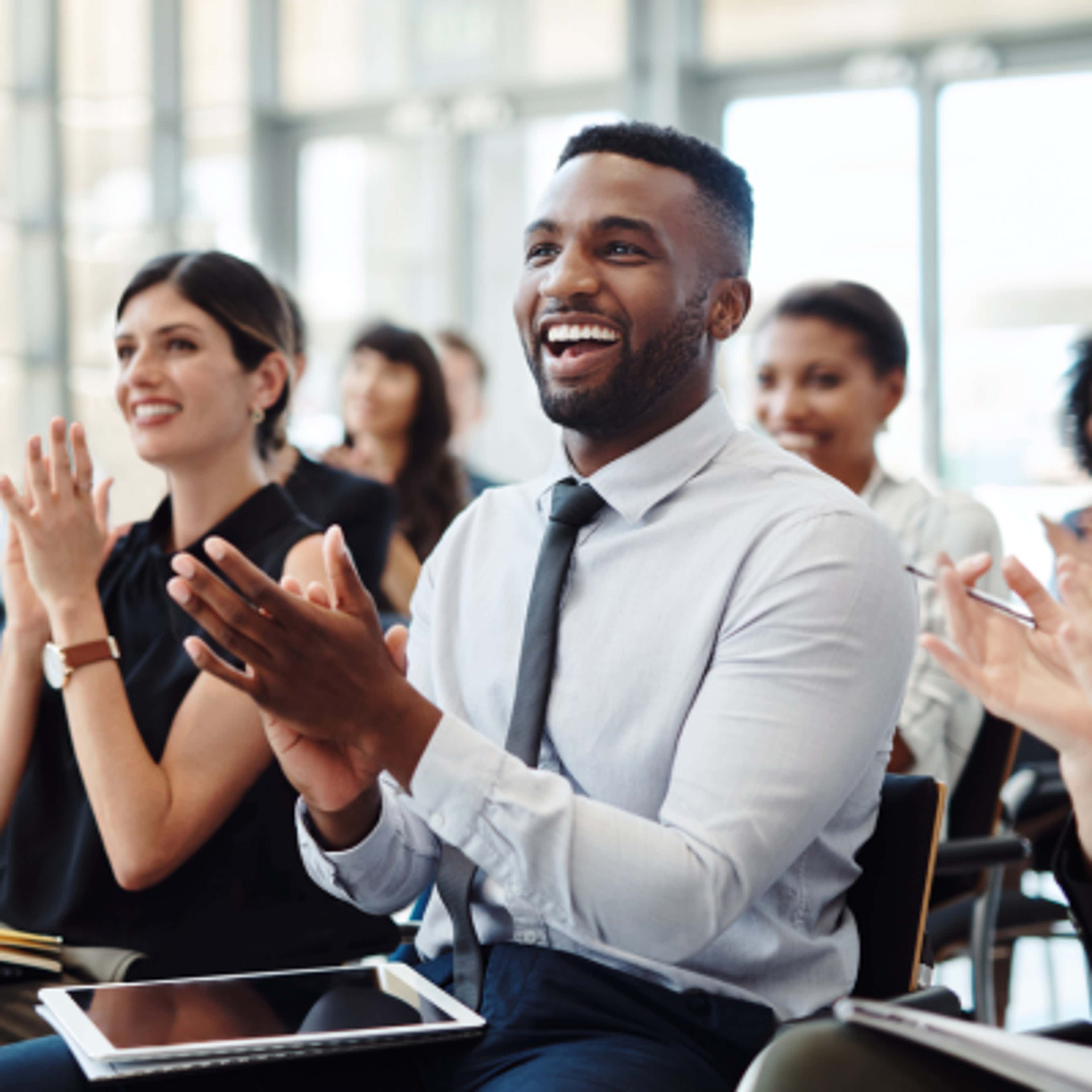 People Clapping and Laughing