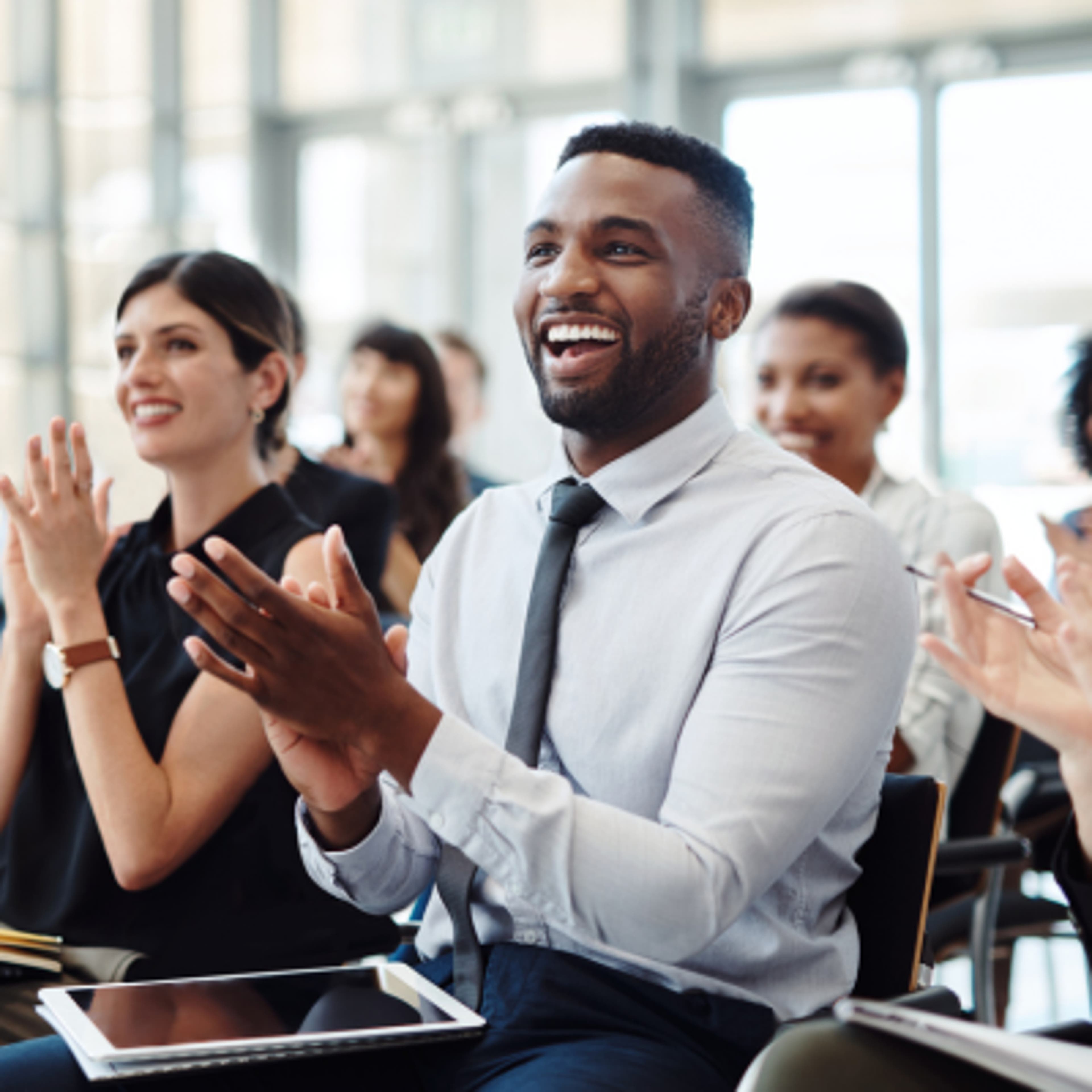 People Clapping and Laughing