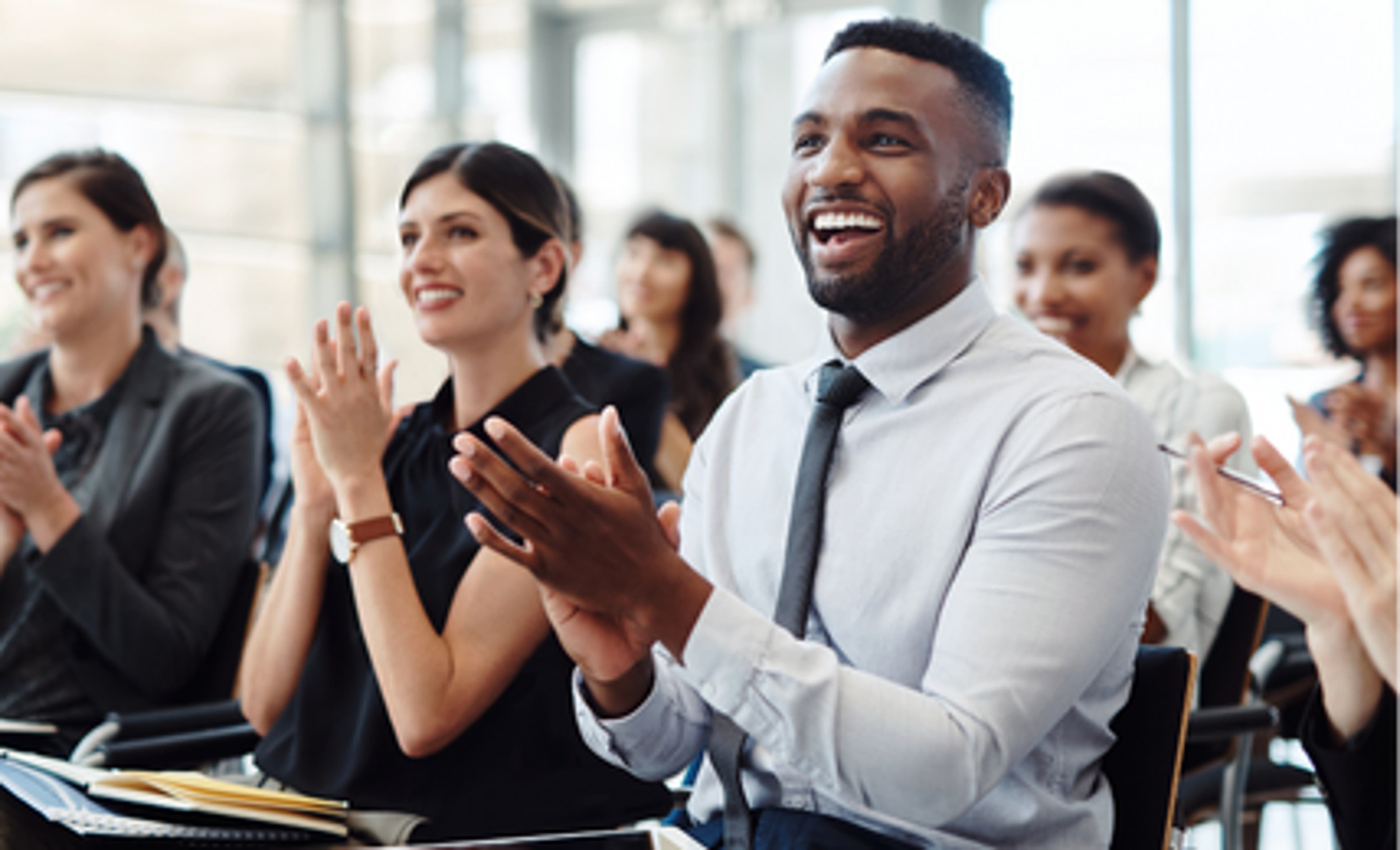 People Clapping and Laughing