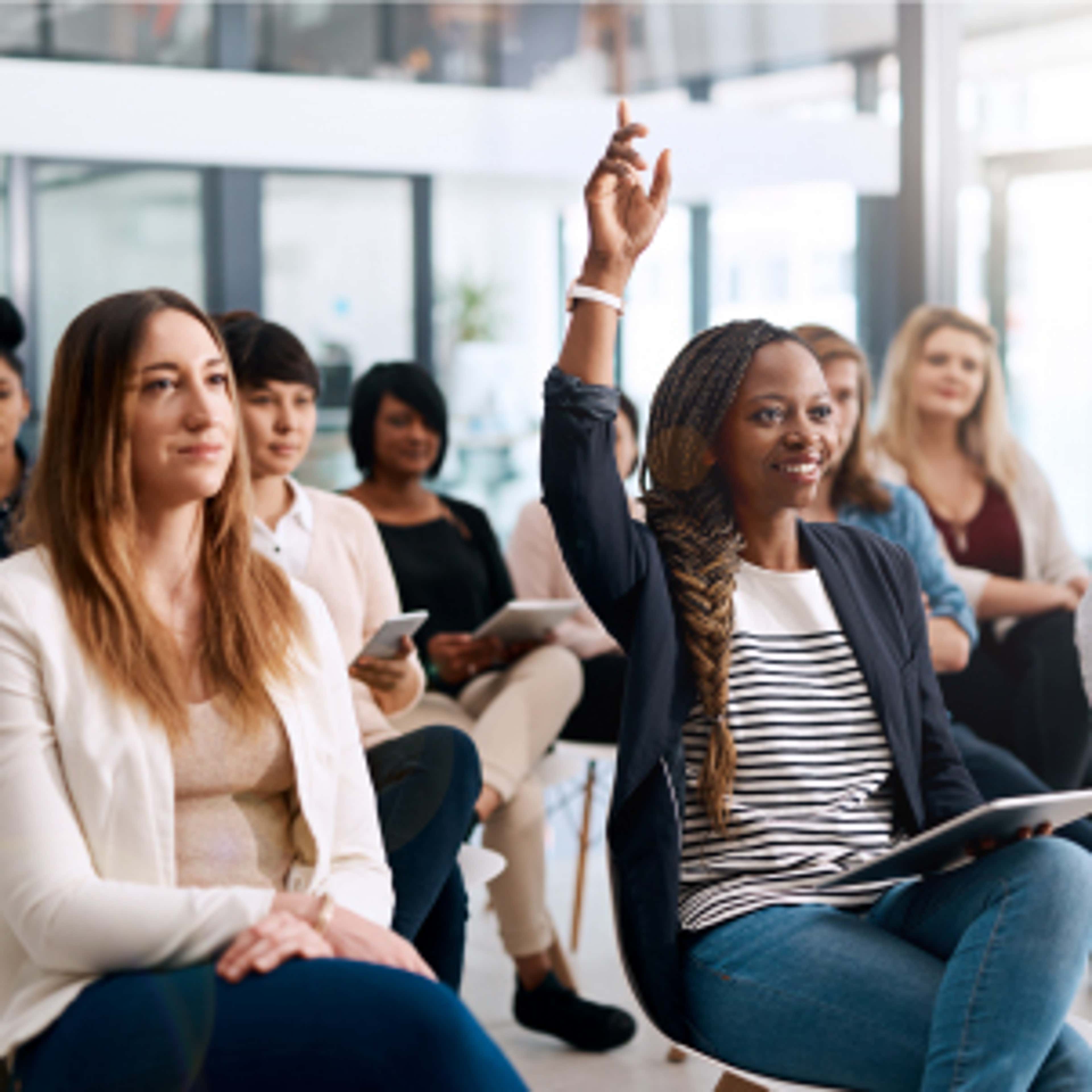 One woman raised her hand up