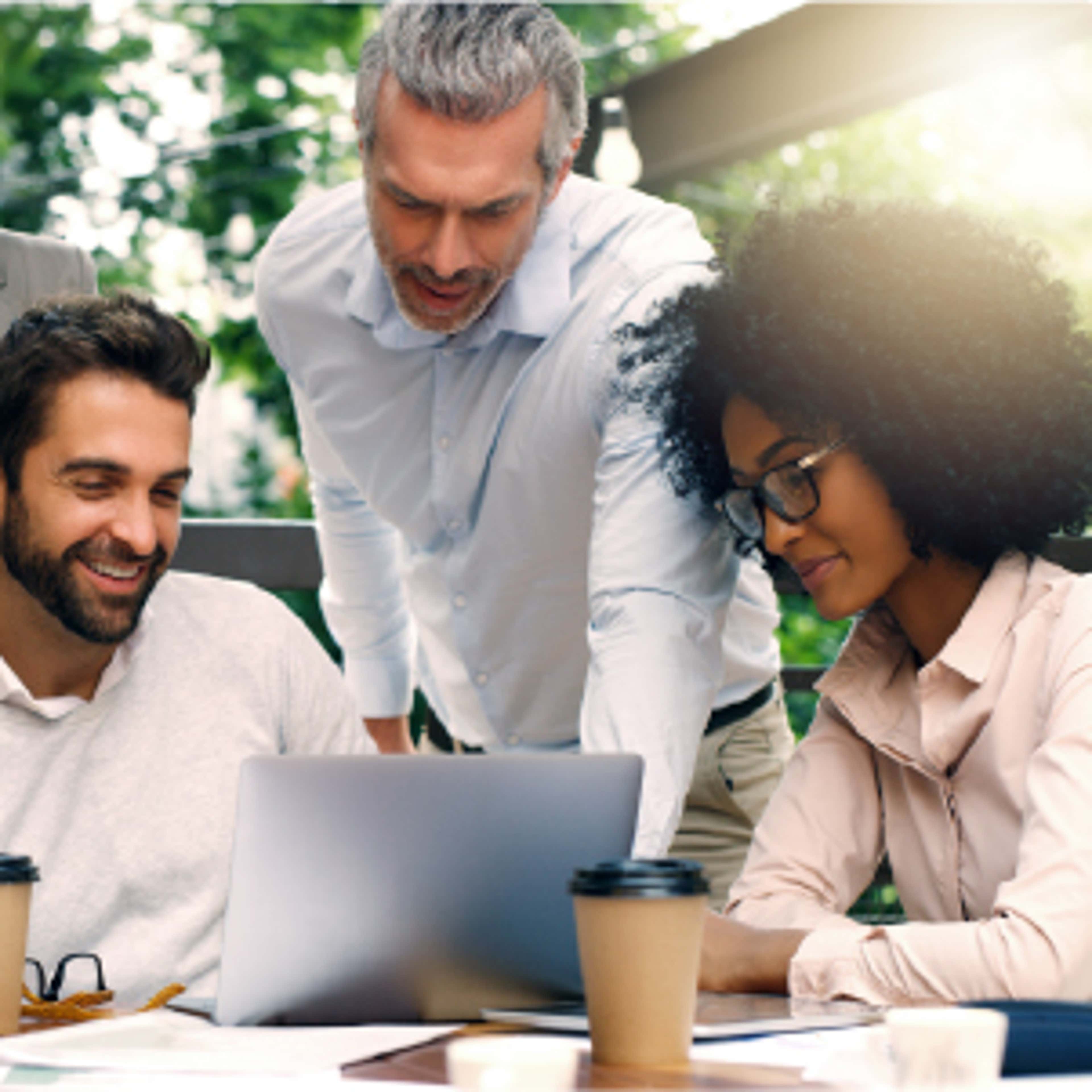 Three people collaborating together