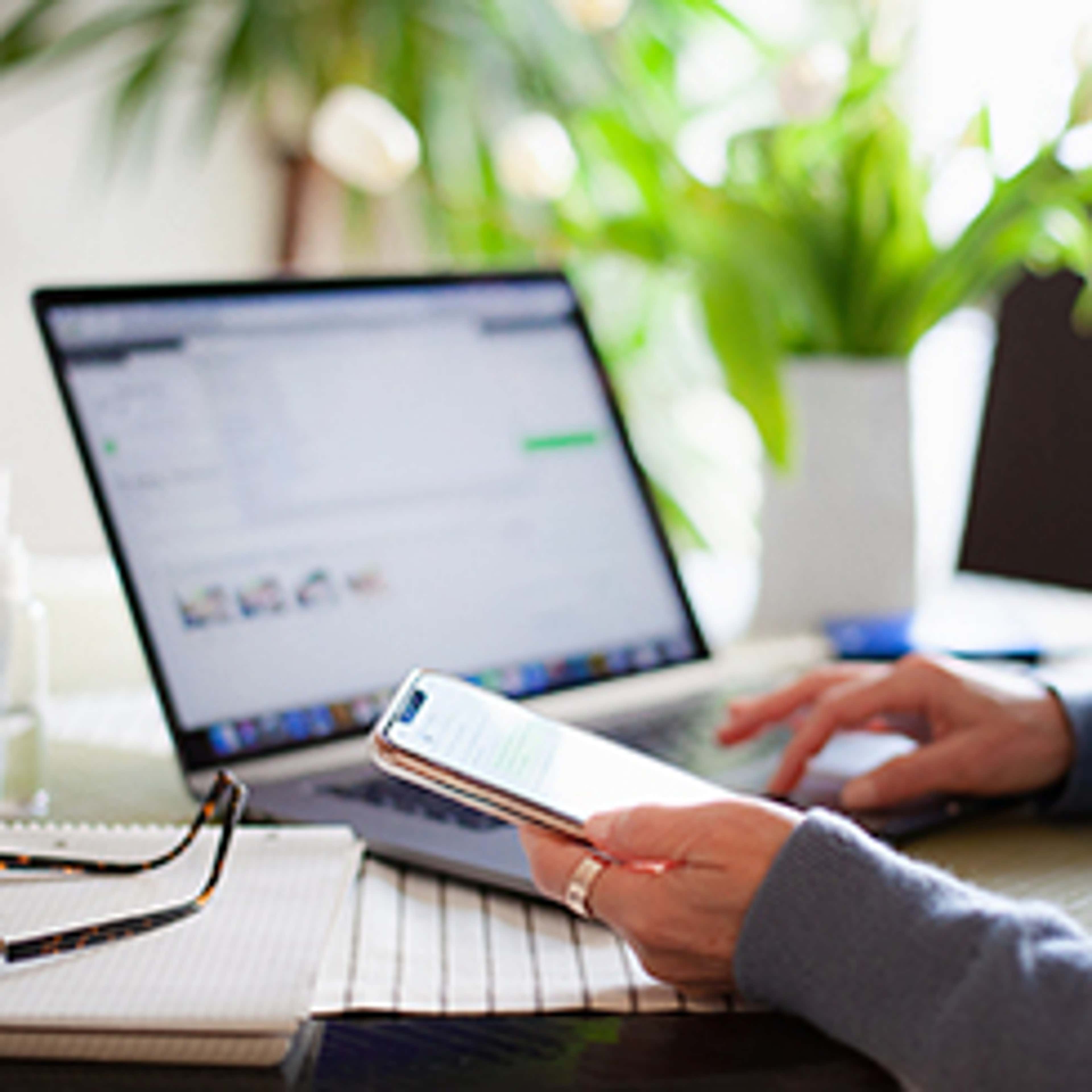 Person's hands on laptop