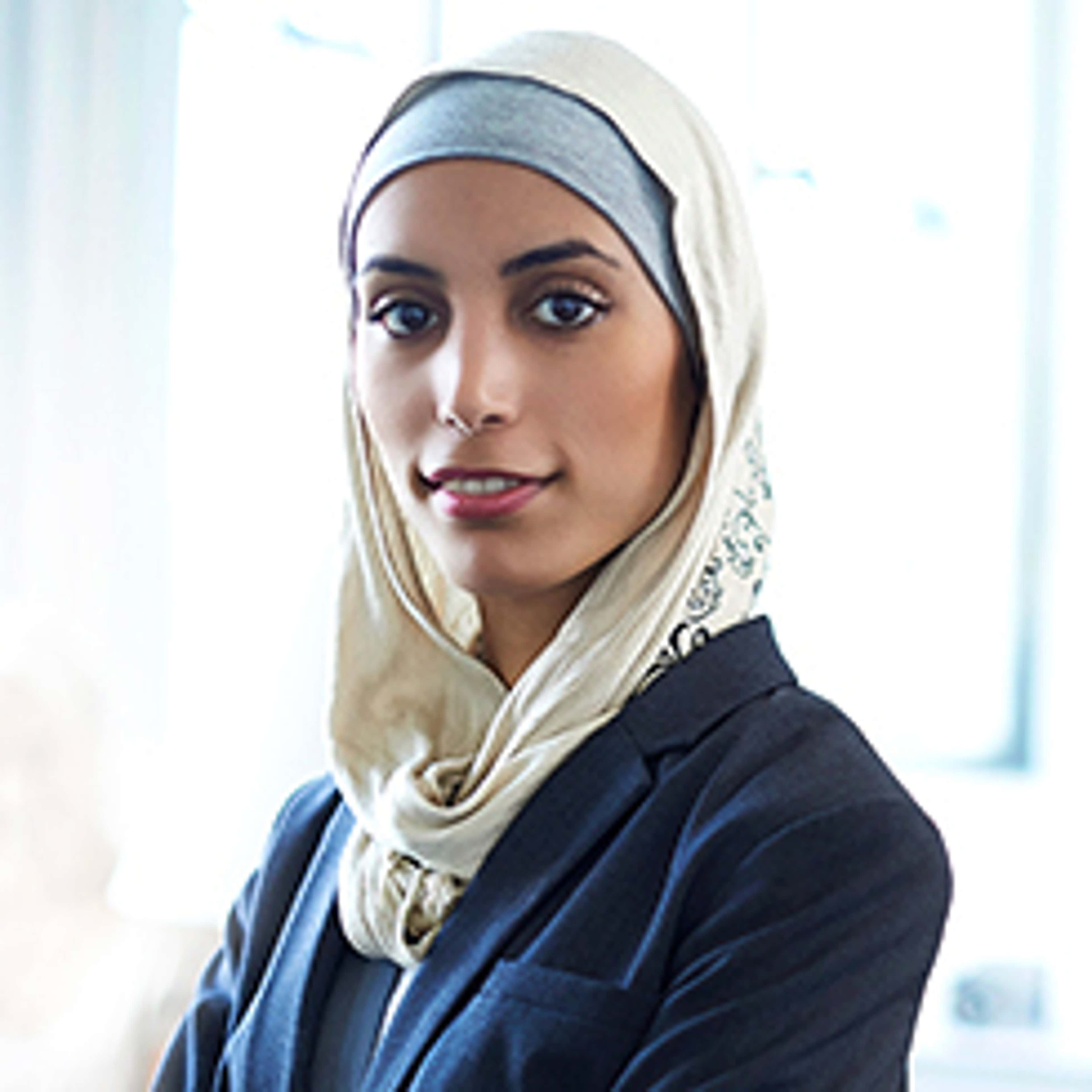 Professional woman looking into camera