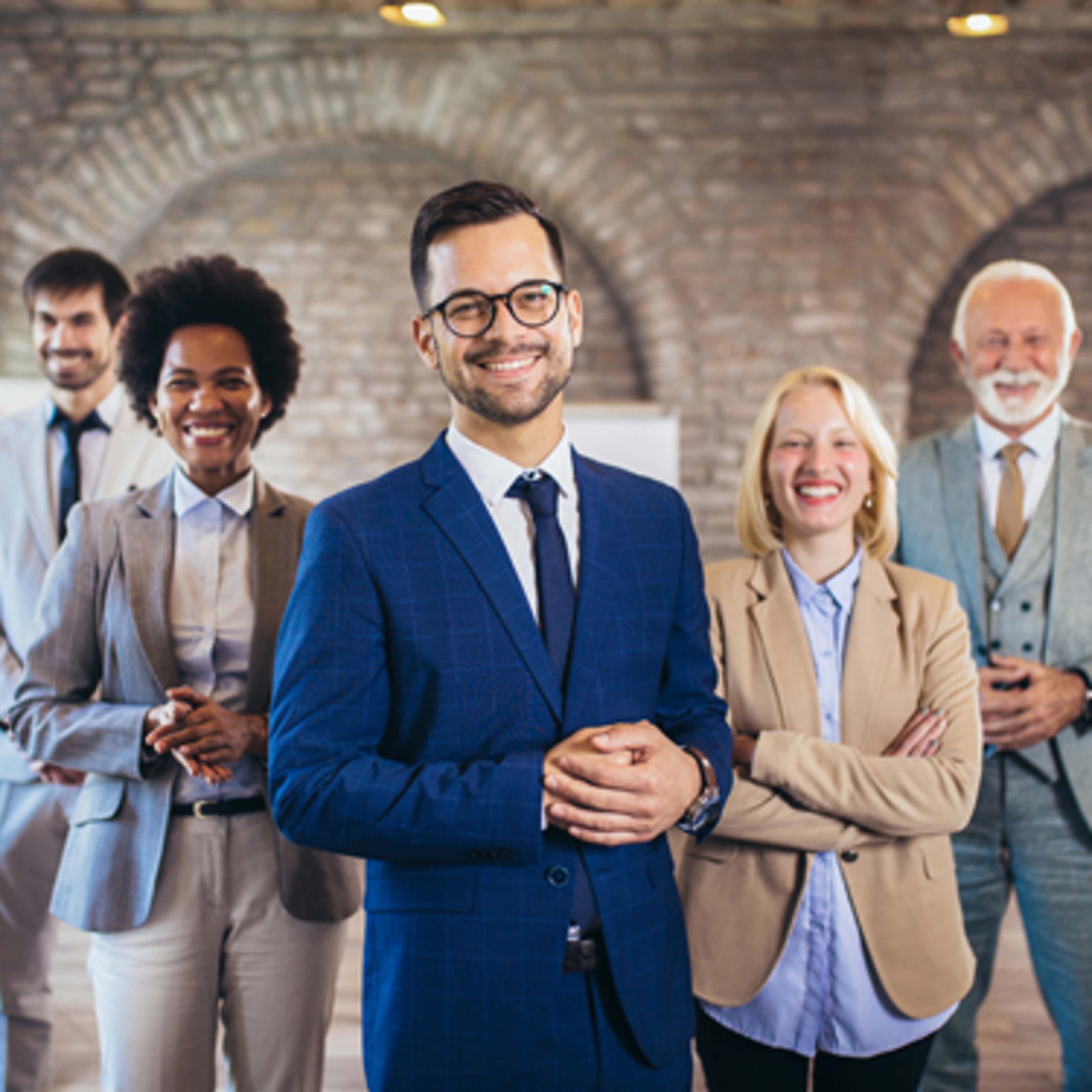A group of people smiling